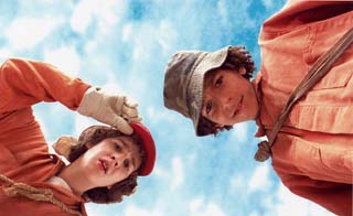 Not as grim as Grimm but darker than Disney's typically sunny repertoire, <i>Holes</i> is set at a prison camp for wayward kids, where the junior criminals must dig holes all day in a dried-out lakebed -- a premise that may not go over well with test-group mommies, but scores off the charts with kids.