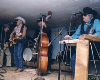 Lawd I'm Just a Country Boy (l-r): John X Reed, Alvin 
Crow, Cowboy Dick Dennis, and Doug Sahm playing 
in the mid-Nineties at the Broken Spoke