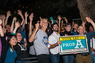 Greg Casar (center, holding sign) with Prop. A supporters during 2018 elections