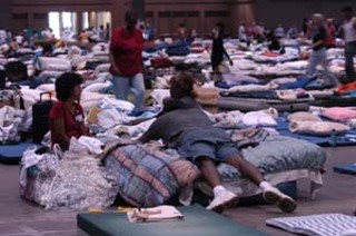 Evacuees from Hurricane Katrina poured into shelters 
across Texas, including the Austin Convention Center. 
Approximately 4,000 people are estimated to have filled 
the center, causing the city to cancel at least one 
convention and scramble to find alternative 
arrangements for others.