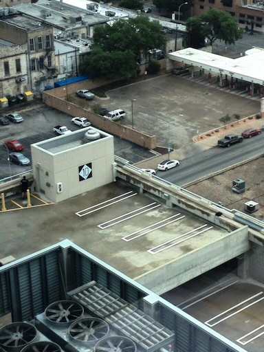 man jumps from parking garage