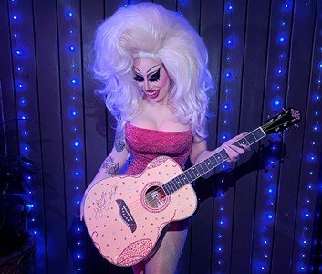 Dolly Parton Gifts Brigitte Bandit a Signed Guitar