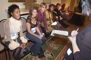 Dana Clark (left) sits with other local American Idol auditioners on Nov. 6. Clark  eventually won the Austin competition, thus landing her a place on the Fox series.
