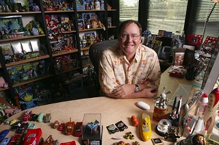 John Lasseter, surrounded by the fruits of his labor