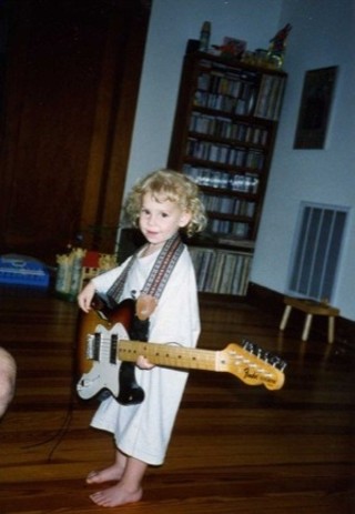 Two years old in Georgetown with one of my dad's guitars!
