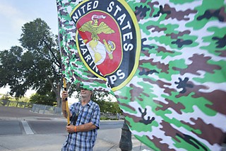 Larry Singleton shows his colors at a July 7 parade and job fair for Iraq veterans as part of an event
organized by a volunteer from the Welcome Home Iraq Veterans Committee and co-sponsored by the city.