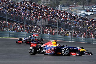 German driver Sebastian Vettel was behind the wheel for Red Bull and came in second in the U.S. Grand Prix. In the background, the full grandstands show off the impressive turnout.