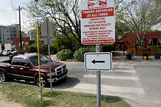 A proposed ordinance is in the city hopper that would allow parkland parking spaces for businesses. A longtime dispute over parking for Casa de Luz patrons, shown in background, served as the catalyst for the proposal, which would apply to all city parks, with amenities for parks.