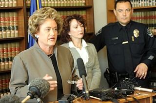 Lehmberg and Austin Police Chief Art Acevedo at a 2009 press conference