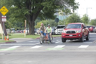 Cyclists can ride with more confidence on Barton Springs Road, thanks to the addition of green lanes – a westbound off-street cycling track and an eastbound widened buffered bike lane.