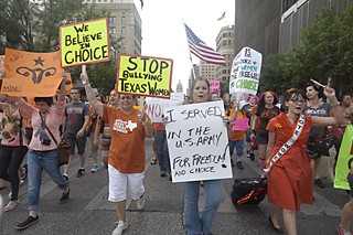Protesters during the Legislature's debate on abortion regs