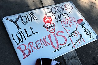 Immigrant rights' supporters respond to an anti-immigration protest in Austin last week. 
For more, see the Battle of the Bullhorns at Newsdesk<b> </b>Aug. 8.