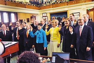 Members of the Texas Senate get sworn-in on Tuesday, Jan. 13,  the first day of the 84th Legislative session. Exiting Lieutenant Governor David Dewhurst relinquishes his post to presiding officer of the Senate, Lt. Gov. Dan Patrick, R-Houston (not pictured here).