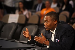 Brandon Reed testifies at a Travis County Commissioners Court hearing regarding restoring face-to-face jail visits at the Travis County Jail, Sept. 22. The matter will be taken up again tomorrow, Tuesday, Sept. 29.