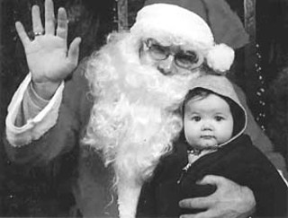 Little Hudson Humphrey celebrated his first Christmas on Santa's lap at last year's Santa in the Garden event at Big Red Sun.