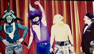 International Men of Mystery: Peelanders Green, Purple & Yellow, with Mike Myers (r) on The Gong Show