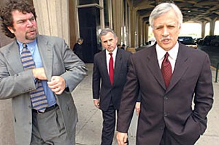Gary Bradley with his lawyers