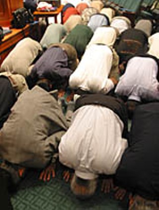 Prayers at the state Capitol during Texas Muslims 
Legislative Day