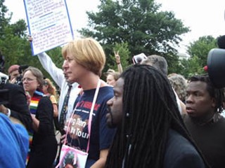 Cindy Sheehan marches in Washington, D.C. – with 
about 100,000 or more of her closest personal friends 
– in her crusade to stop the Iraq war. On Monday, 
Sheehan was arrested for refusing to leave her spot in 
front of the White House.<br>(Photo courtesy of 
David Swanson/afterdowningstreet.org)