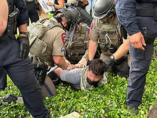 A protester being arrested at UT-Austin