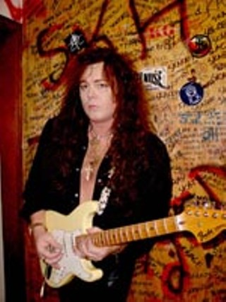 The Writing on the Wall: Yngwie Malmsteen backstage at the Back Room, SXSW 2001
