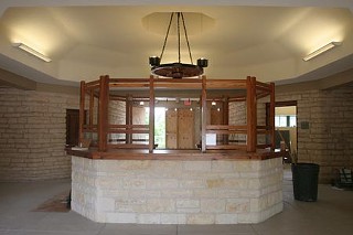 The decision was made to repair the pagoda-style roof immediately, while maintaining the original structure and as much of the original materials as could be salvaged. That work was completed in June 2005. The modernized and enlarged kiosk, finished this month, now sits under the restored roof with its new spire.