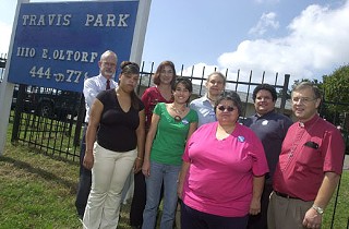 Activists and residents in front of Travis Park: (back row, l-r) Steve Jackobs (Austin Interfaith organizer), Lisa Robertson (Travis Heights Elementary principal), Terry Franz (South River City Citizens), Jose Guerrero (St. Ignatius Martyr Catholic Church), Pastor Alfred Krebs (Prince of Peace Lutheran Church); (front row, l-r) Quisha Boyd, Dani Hall, and Ruby Roa (San Jose Catholic Church). Travis Heights Elementary, St. Ignatius, Prince of Peace, and San Jose are all member institutions of Austin Interfaith; Boyd and Hall are residents of Travis Park.