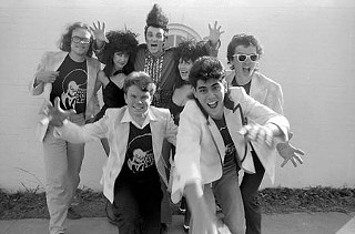 Posing for Band of the Year in 1986 with some of the Trash crew (l-r rear): John Mills, Kari Puckett, Dino Lee, Margaret Moser, Troy Dillinger; front: Mike English, Hector Muñoz.