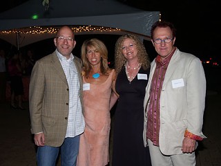 Philanthropists and art collectors Eric and Maria Groten with artists Donna Tolar and Edward Povey at the Zach Scott Stagehands fundraiser.