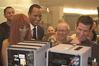 Stars Bai Ling and Dwayne Johnson on set with writer/director Richard Kelly (far right)