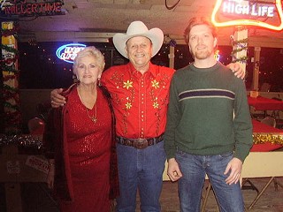Annetta and James White, owners of the Broken Spoke, along with Jason Crow (son of Alvin) at the Broken Spoke's private Christmas party