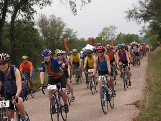 Enthusiastic riders raise money while biking through glorious wildflower country at last year's Hill Country Ride for AIDS.