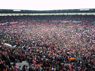 Stoke City fans storm the pitch following the 0-0 tie with Leicester City that clinched their promotion to the Premiership