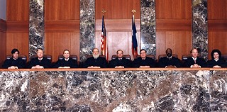 Texas’ Court of Criminal Appeals in 1994, the year that Republicans Sharon Keller (far right) and one-term-wonder Stephen Mansfield (far left) were elected to the court. Baird (third from left) would be the last Democrat voted off the court, in 1998.