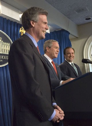 McClellan and his successor as White House press secretary, former Fox News host Tony Snow, flank the president.