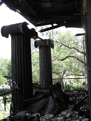 The burned front porch of the Governor's Mansion