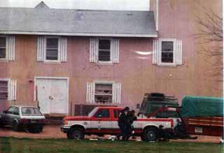 ATF agents retreat from Mount Carmel after the raid.