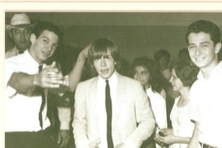 Scotty Melton (left) and Harvey Kagan (right) flank Brian Jones of the Rolling Stones (center) circa 1966