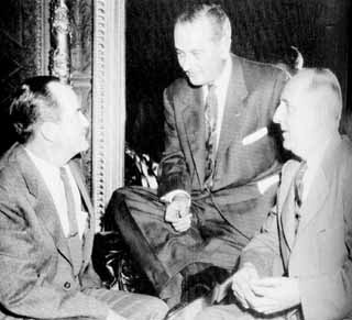 Johnson between Hubert Humphrey (l) and Richard Russell.  From <i>The Years of Lyndon Johnson: Master of the Senate</i>.