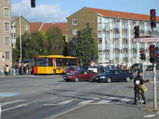 Pedestrians, bus, cars, bike and room for all