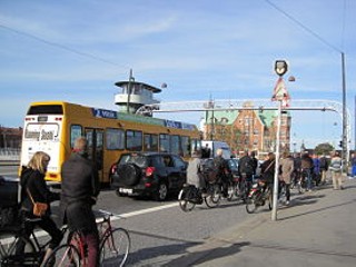 Pedestrians, bus, cars, bike and room for all