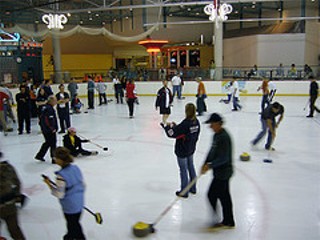 An open house curling event at Chaparral Ice