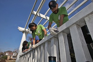 Volunteers prep the venerable Wooldridge Square gazebo for a fresh coat of paint as part of It's My Park Day, sponsored by the Austin Parks Foundation. The gazebo, built in 1910, is Downtown Austin's oldest such pagoda.